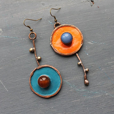 Boucles d'oreilles asymétriques Graffiti en bronze antique