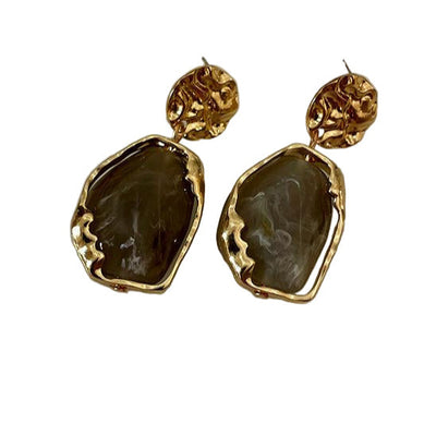 Boucles d’oreilles faites main avec une grande pierre de lune