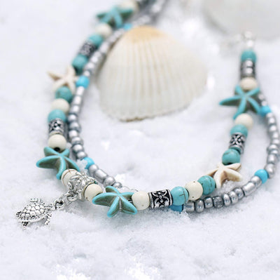 Cheville marine avec étoile de mer et tortue