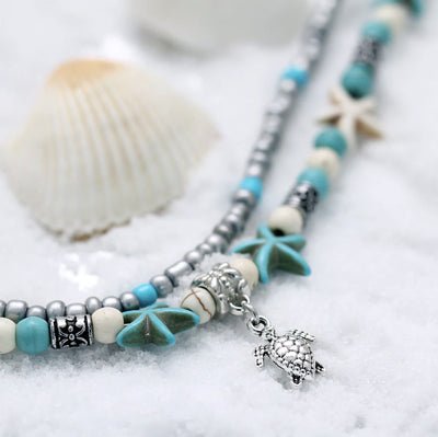 Cheville marine avec étoile de mer et tortue