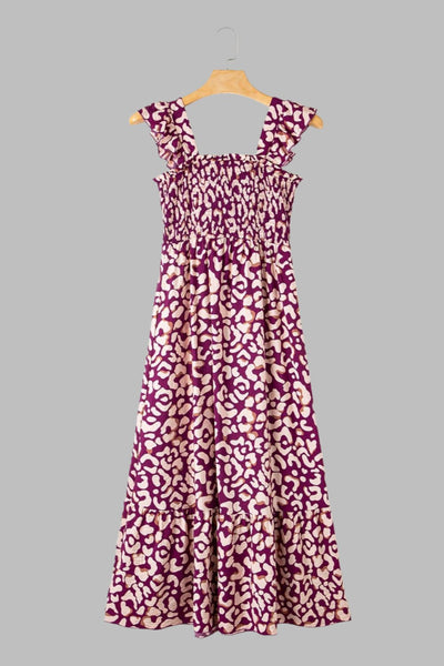Geneviève - Robe midi à volants et coupe large