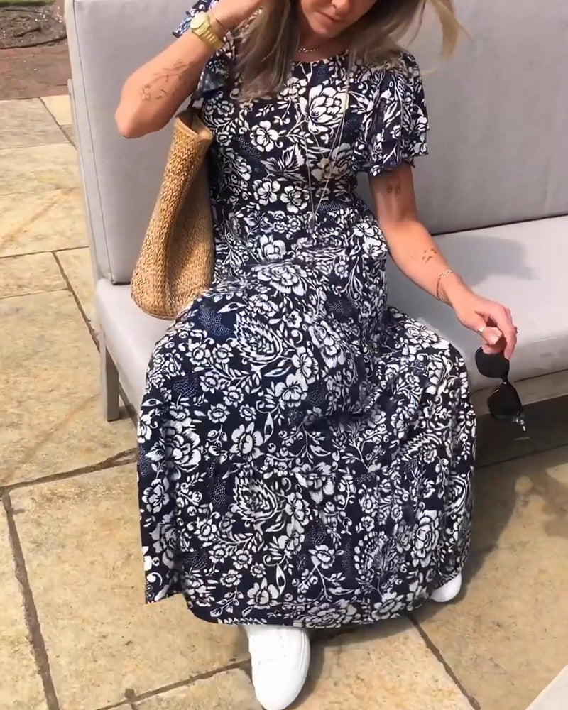 Zaar| Robe longue à manches courtes avec motif floral