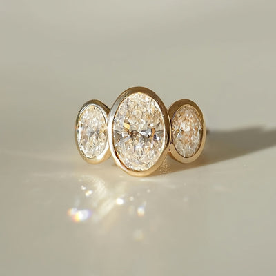 Bague en or 18K avec 3 grandes pierres précieuses