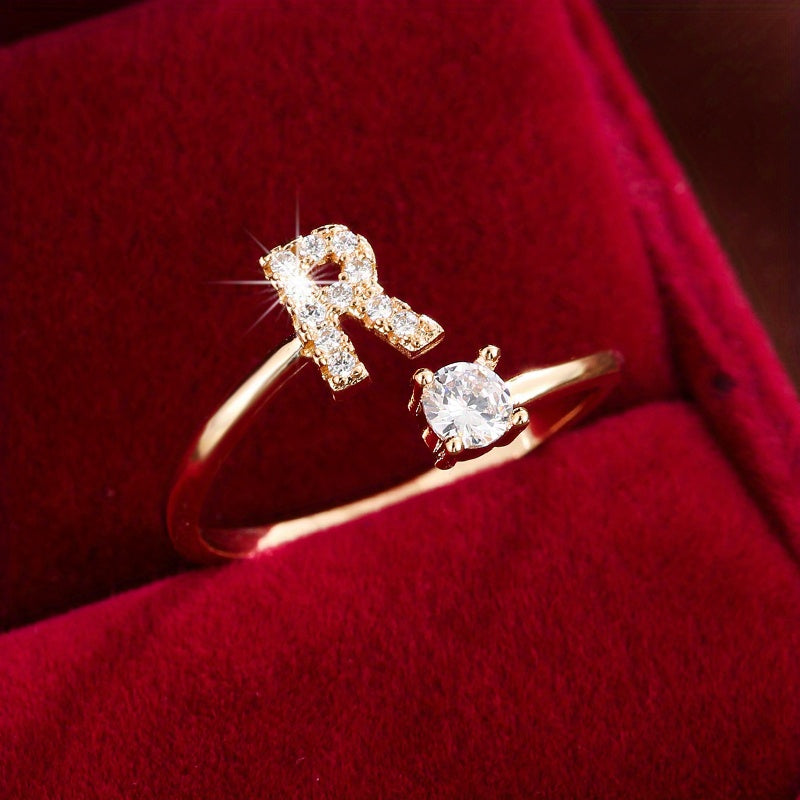 Bague initiale personnalisée en zircons scintillants