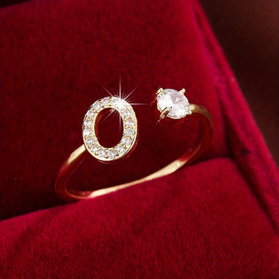 Bague initiale personnalisée en zircons scintillants