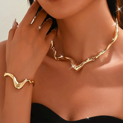 Parure collier et bracelet en or 18K au design lave