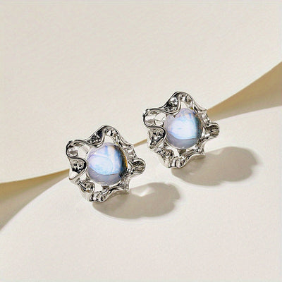 Boucles d’oreilles fleur en pierre de lune