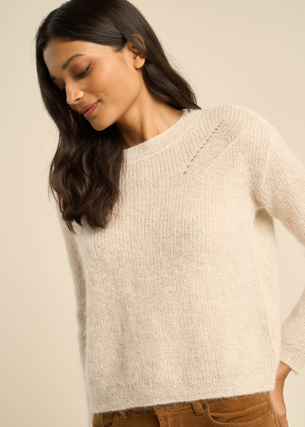 Pull col rond à détails brillants