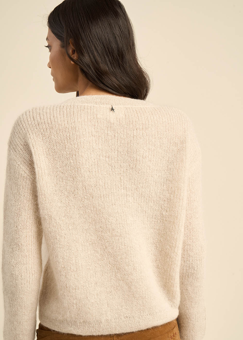 Pull col rond à détails brillants
