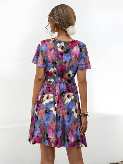 Hélène - Mini robe avec ceinture à la taille et motif floral