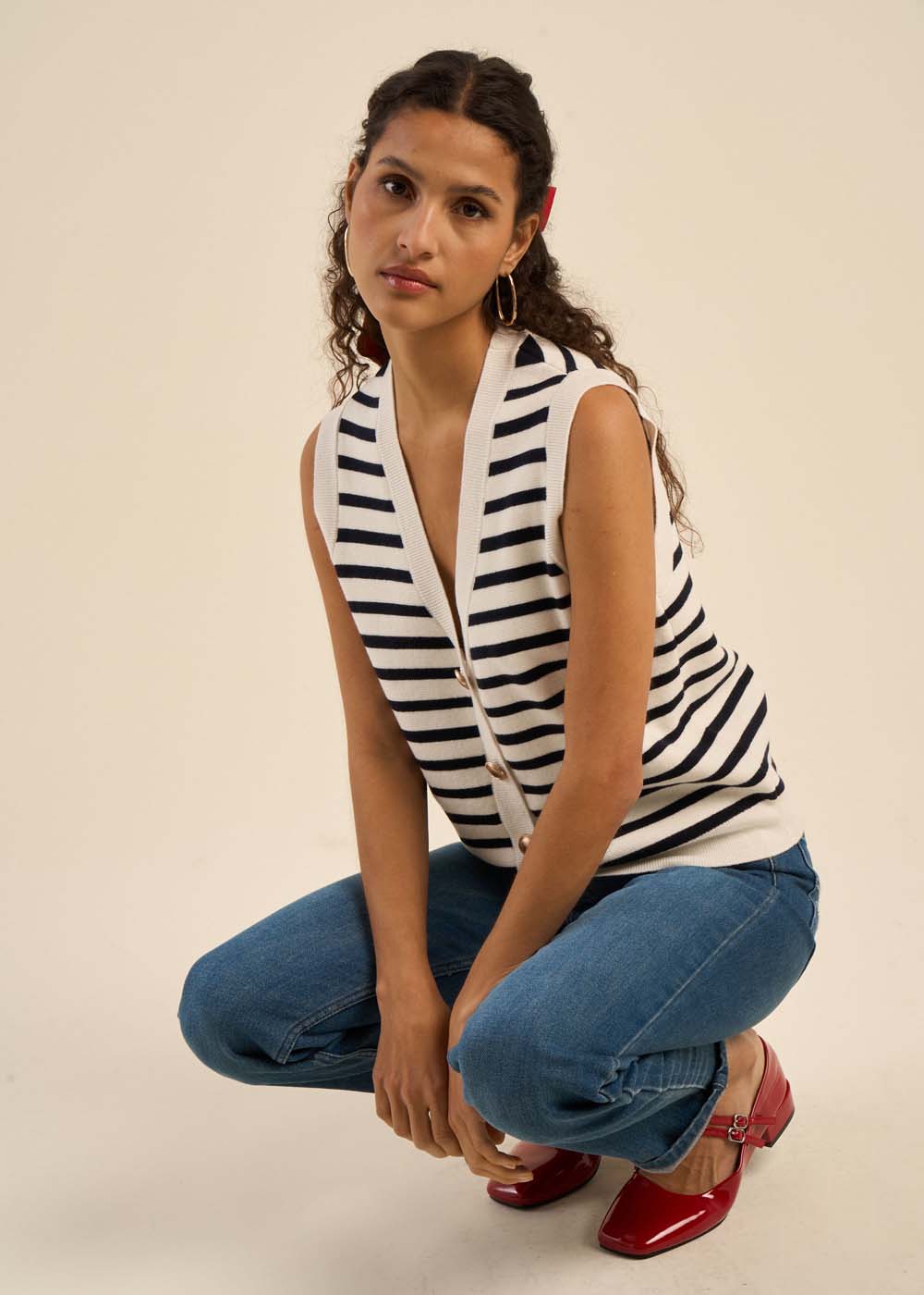 Gilet sans manches avec boutons bijoux