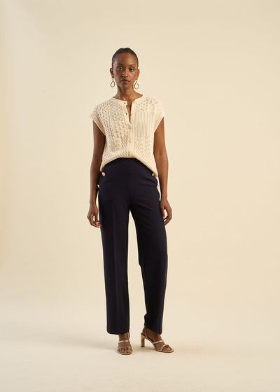 Pantalon effet pont à boutons dorés