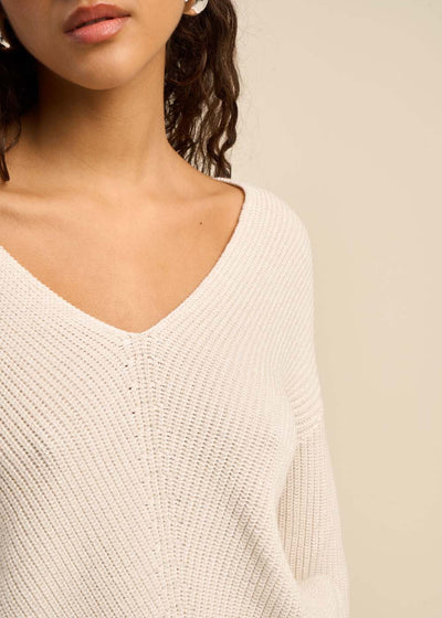 Pull ample à col V avec détails en lurex