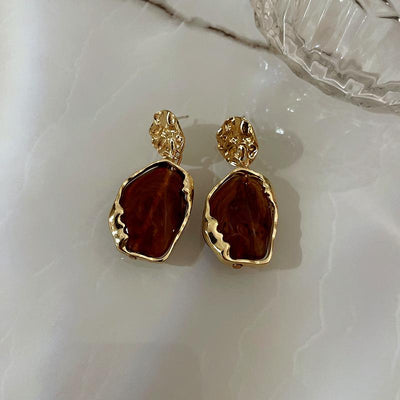 Boucles d’oreilles faites main avec une grande pierre de lune