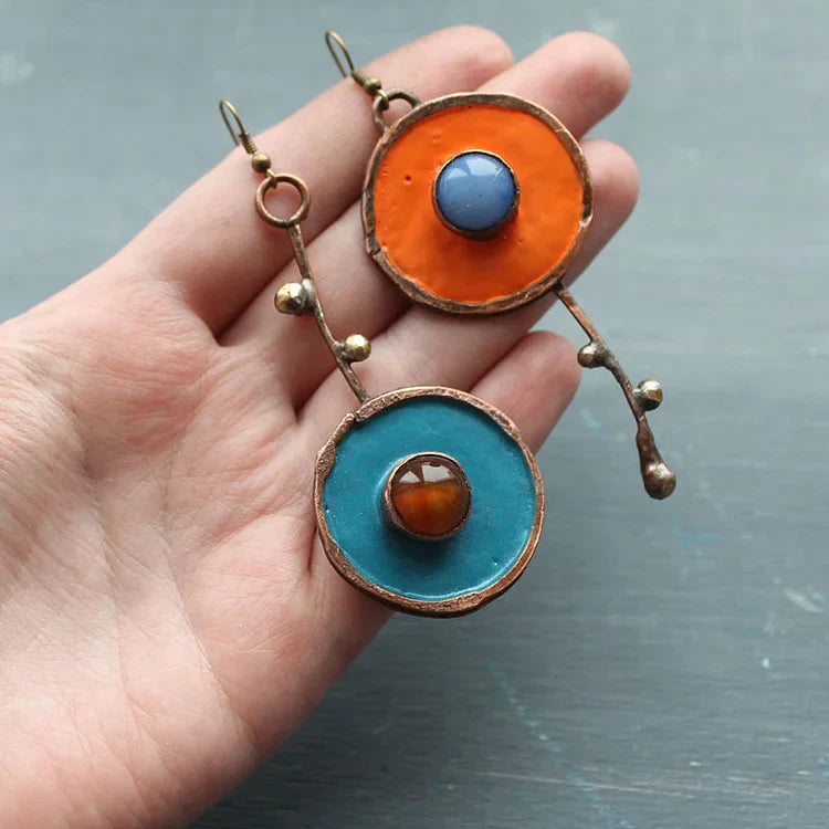 Boucles d'oreilles asymétriques Graffiti en bronze antique