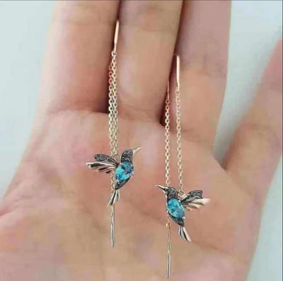 Boucles d'oreilles oiseaux en zirconium mixte