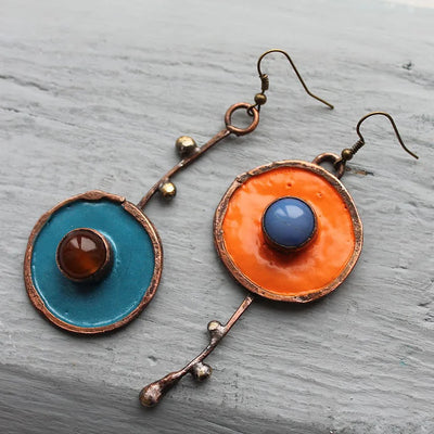 Boucles d'oreilles asymétriques Graffiti en bronze antique