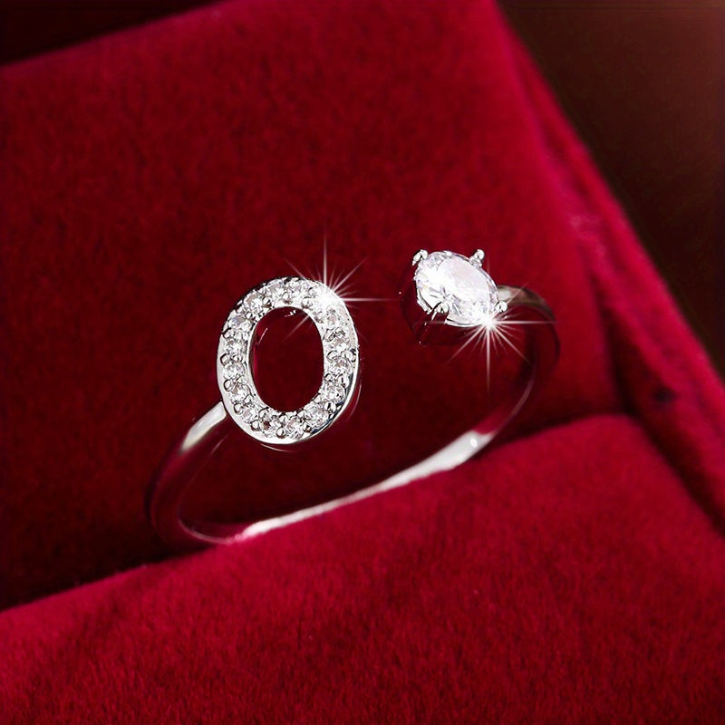 Bague initiale personnalisée en zircons scintillants
