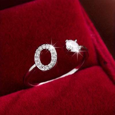 Bague initiale personnalisée en zircons scintillants