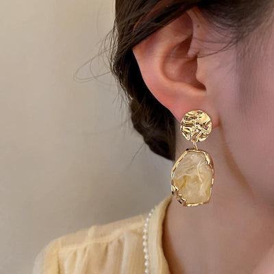 Boucles d’oreilles faites main avec une grande pierre de lune