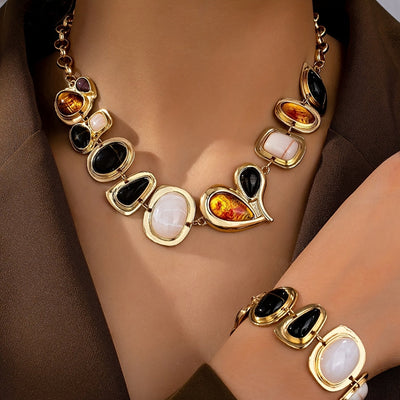Parure collier et bracelet en or 18K avec pierres précieuses