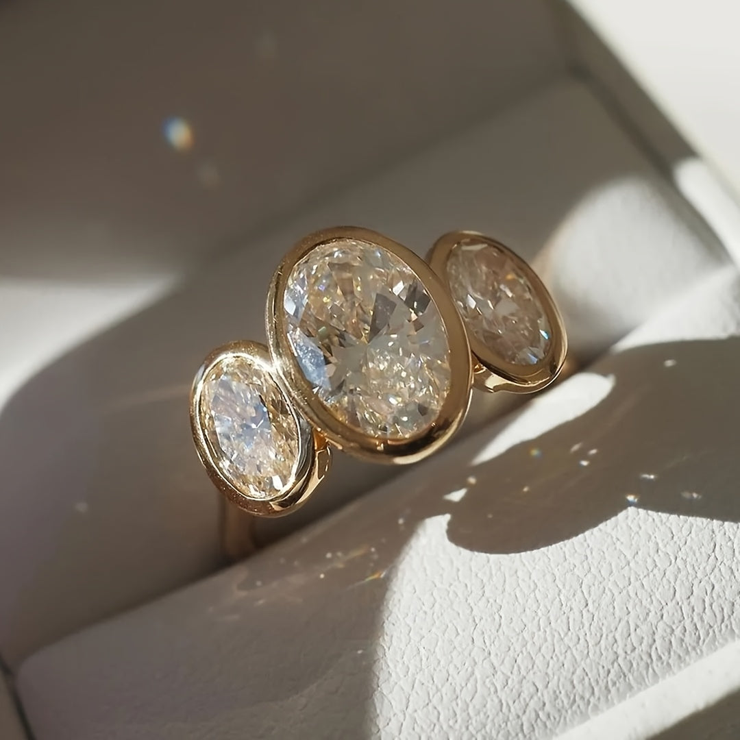 Bague en or 18K avec 3 grandes pierres précieuses
