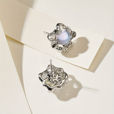 Boucles d’oreilles fleur en pierre de lune
