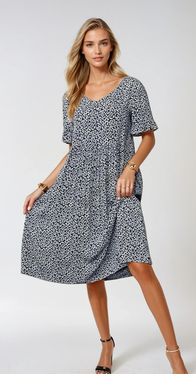 Léa - Robe midi élégante à pois pour toutes les occasions