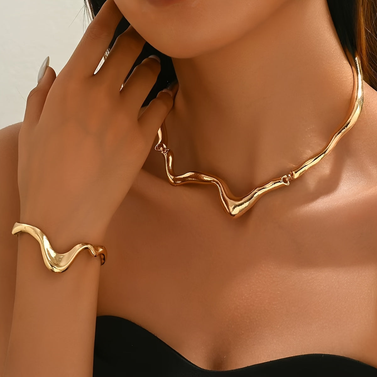 Parure collier et bracelet en or 18K au design lave