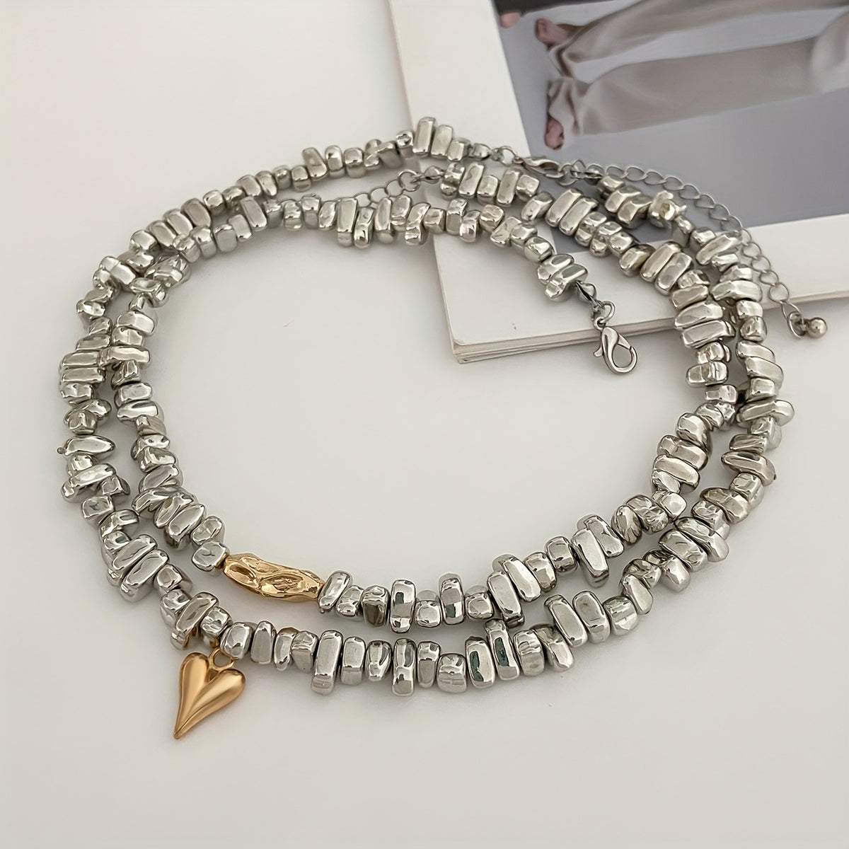Parure de 2 colliers en pierres argentées avec accents en or 18K