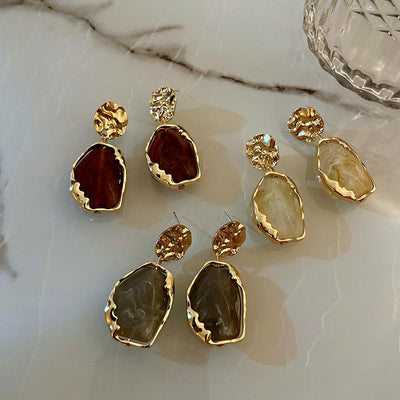 Boucles d’oreilles faites main avec une grande pierre de lune