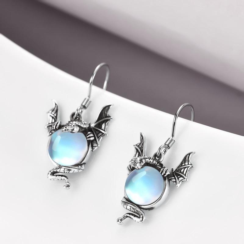 Boucles d’oreilles dragon en pierre de lune