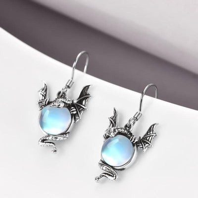 Boucles d’oreilles dragon en pierre de lune