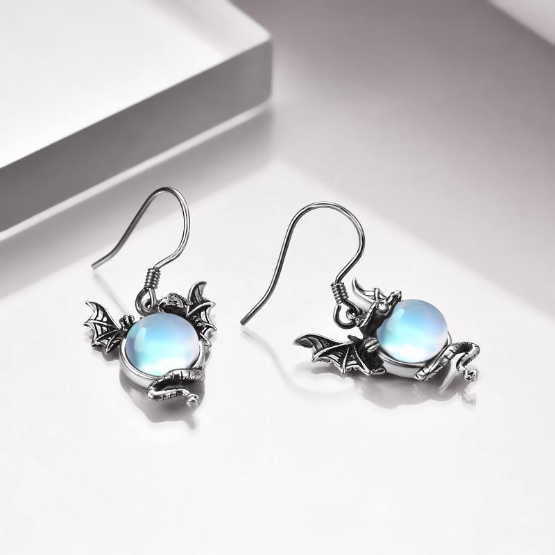 Boucles d’oreilles dragon en pierre de lune