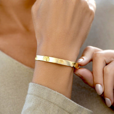 Edmonton Essence™ | Engraved Cuff Bracelet  
A motivational accessory for strength.