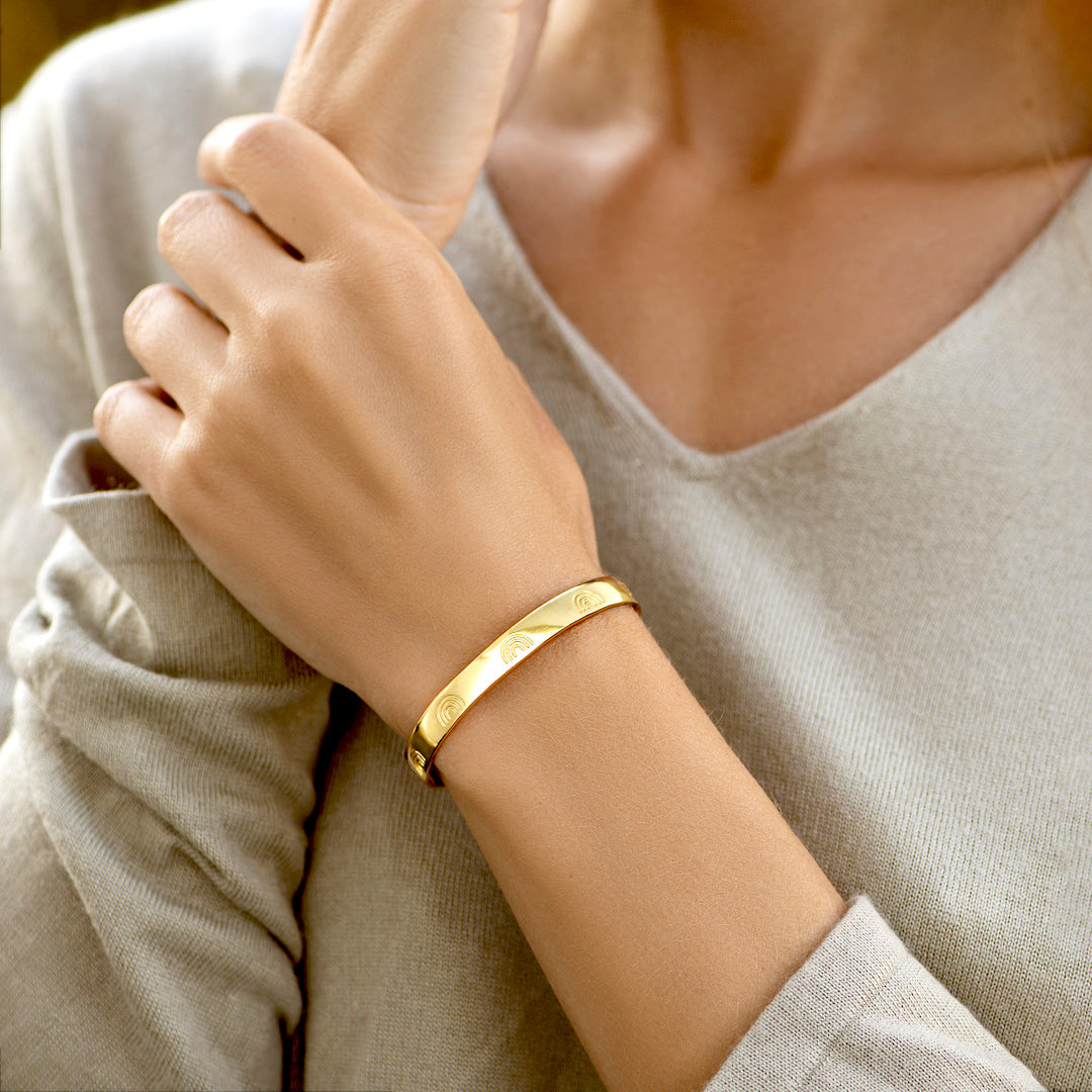Edmonton Essence™ | Engraved Cuff Bracelet  
A motivational accessory for strength.