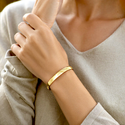 Edmonton Essence™ | Engraved Cuff Bracelet  
A motivational accessory for strength.