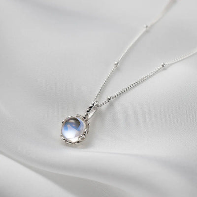 Collier pendentif rond en pierre de lune