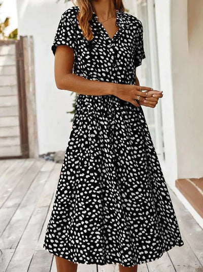 Monique - Robe midi boho à fleurs et décolleté en V