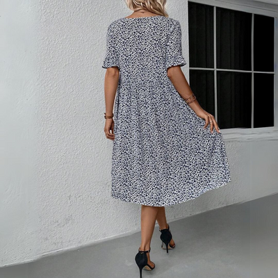Léa - Robe midi élégante à pois pour toutes les occasions