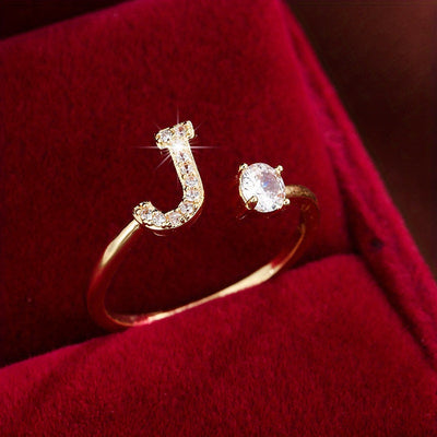 Bague initiale personnalisée en zircons scintillants