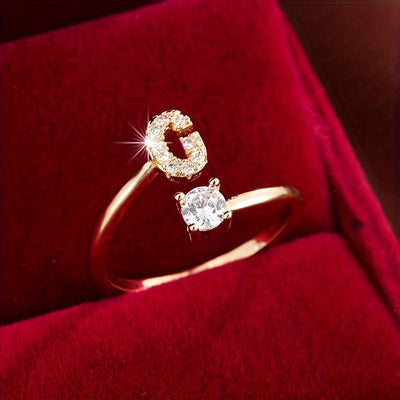 Bague initiale personnalisée en zircons scintillants