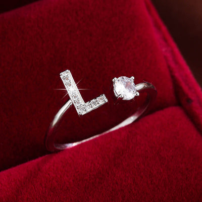 Bague initiale personnalisée en zircons scintillants
