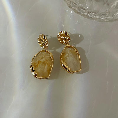 Boucles d’oreilles faites main avec une grande pierre de lune