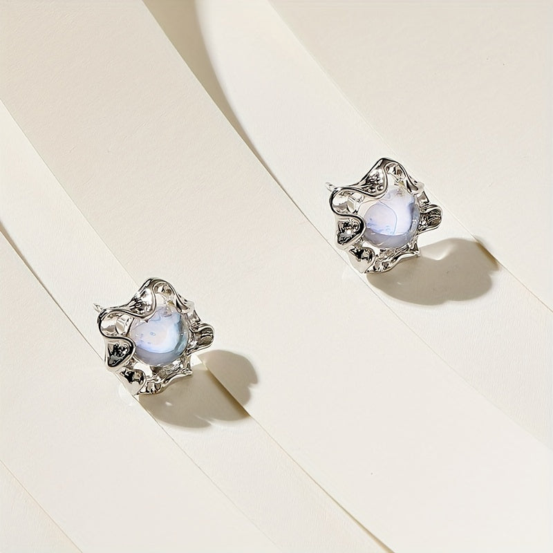 Boucles d’oreilles fleur en pierre de lune