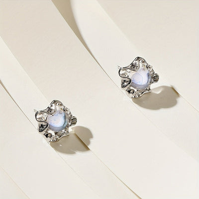 Boucles d’oreilles fleur en pierre de lune