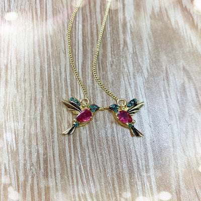 Boucles d'oreilles oiseaux en zirconium mixte