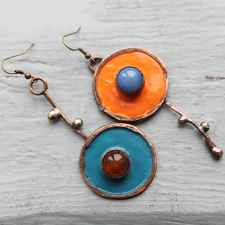 Boucles d'oreilles asymétriques Graffiti en bronze antique