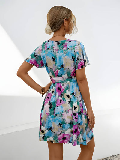 Hélène - Mini robe avec ceinture à la taille et motif floral