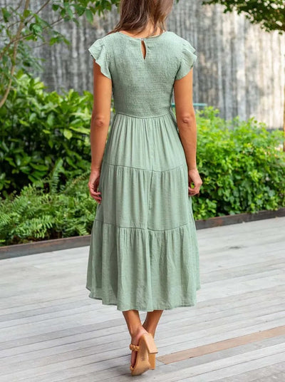 Theudelinda – Robe d’été fluide à volants et poches intégrées